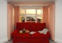 Red double en suite bedroom with sea views